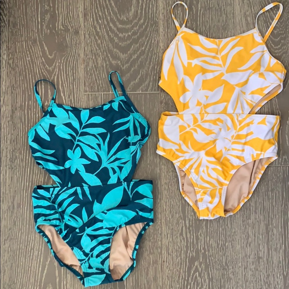 Two cute side showing one piece